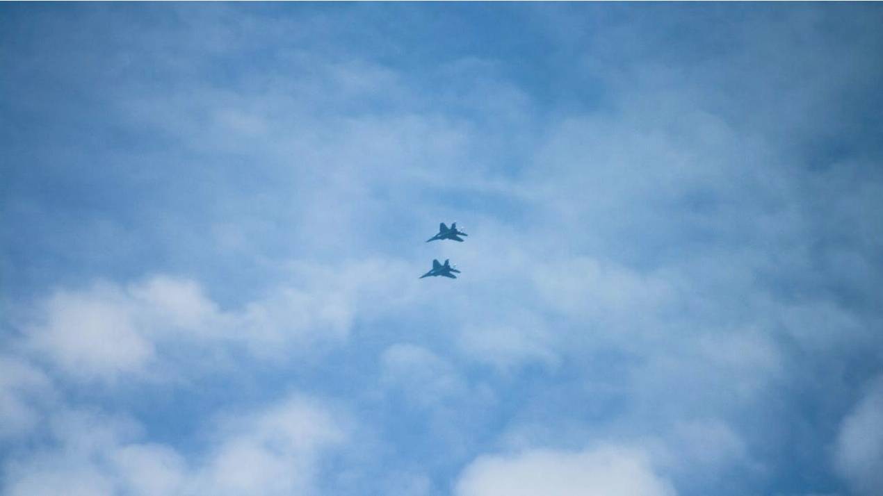 Passenger using calculator